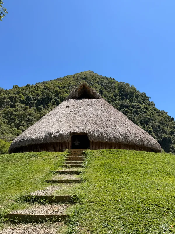 Ancestral ceremonial maloka with thatched roof at Parque Comfama Cerro Tusa, 5 minutes from La Juana estate